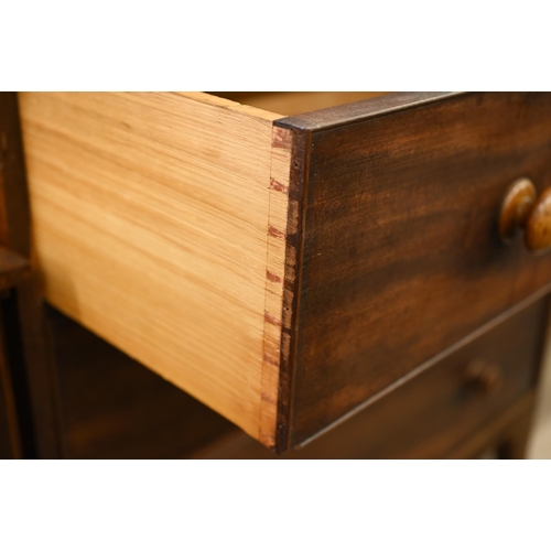 184 - A large 19th century mahogany chest of two short over three long drawers on splayed bracket feet, 10... 