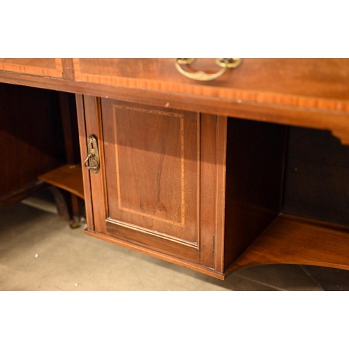 185 - An Edwardian walnut writing table with tooled tan leather top and two frieze drawers, 108 x 54 x 78 ... 