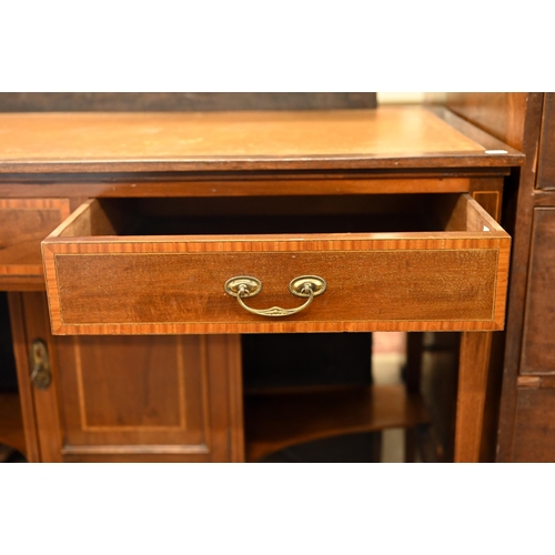 185 - An Edwardian walnut writing table with tooled tan leather top and two frieze drawers, 108 x 54 x 78 ... 