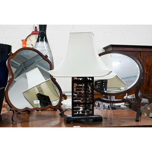 188 - Two Edwardian walnut framed dressing table mirrors to/w ebonised 'abacus' lamp and 1950s bevelled wa... 