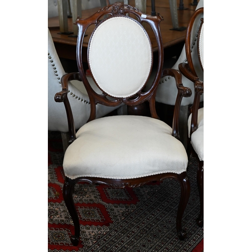 189 - A pair of Hepplewhite style open armchairs