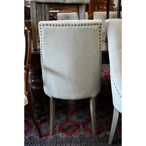 191 - Six contemporary stone-grey button back dining chairs with lime washed supports