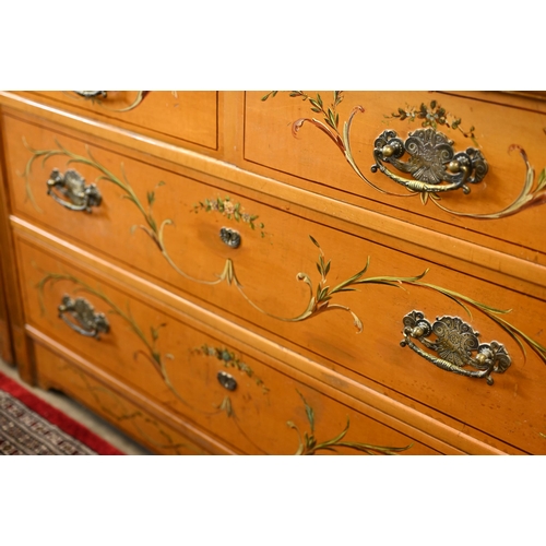 193 - A 19th century satinwood chest of two short over two long drawers painted with classical garlands in... 