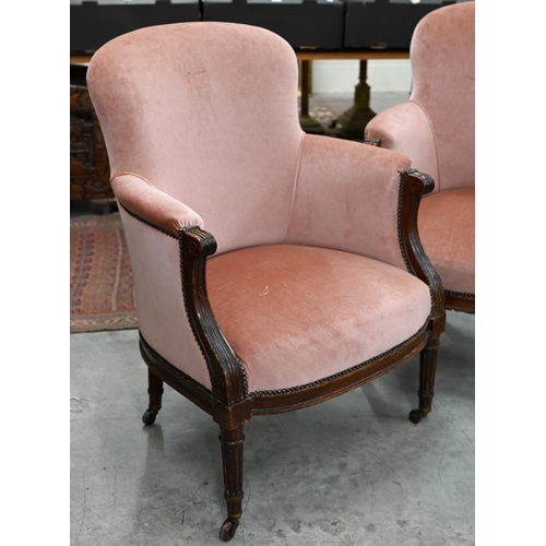 203 - A pair of Victorian mahogany framed armchairs, pink dralon upholstery (2)