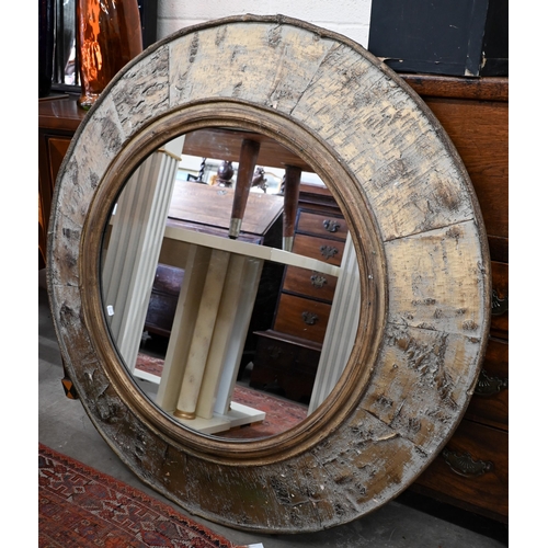 227 - A large circular wall mirror in gilt faux-bois frame, 120 cm diam to/w another modern cushion frame ... 