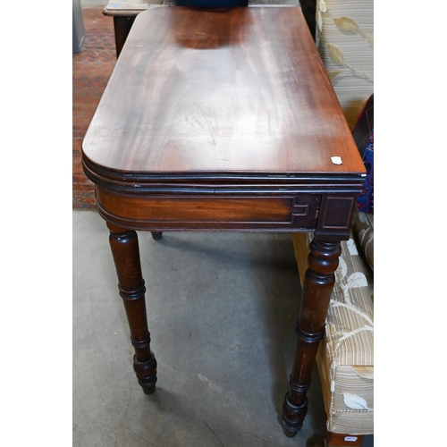 237 - A 19th century mahogany folding tea table on turned supports, 90 x 44 x 70 cm high