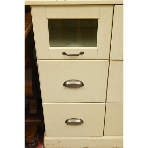 246 - A cream-painted (possibly Laura Ashley) haberdashery chest with three glazed and six standard drawer... 