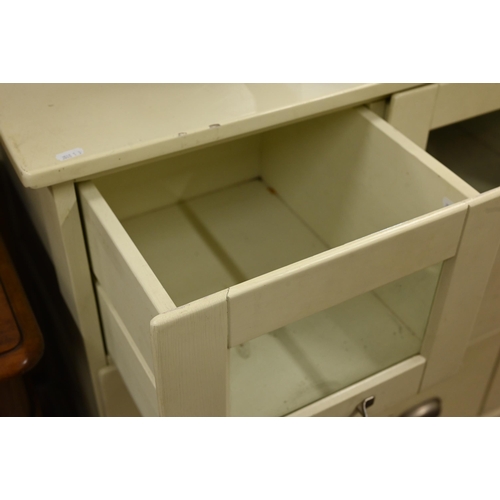 246 - A cream-painted (possibly Laura Ashley) haberdashery chest with three glazed and six standard drawer... 