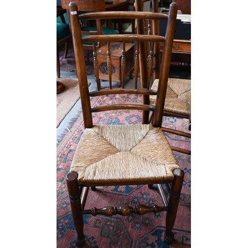 255 - An oak draw-leaf refectory dining table with cleated planked top on turned supports with stretchers,... 