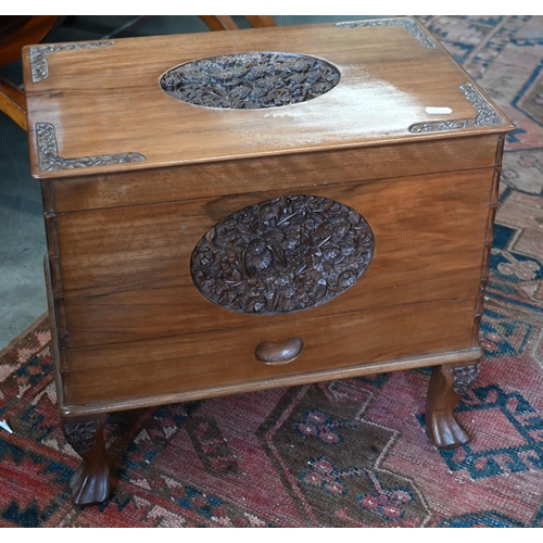 257 - An Indian hardwood sewing/work box with carved floral decoration, 44 x 28 x 40 cm high