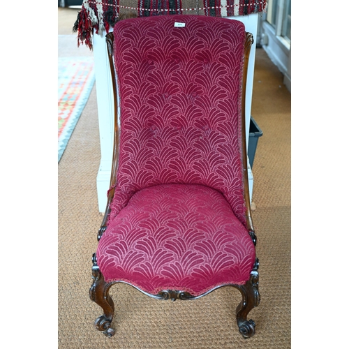 274 - A Victorian mahogany framed scroll back salon chair