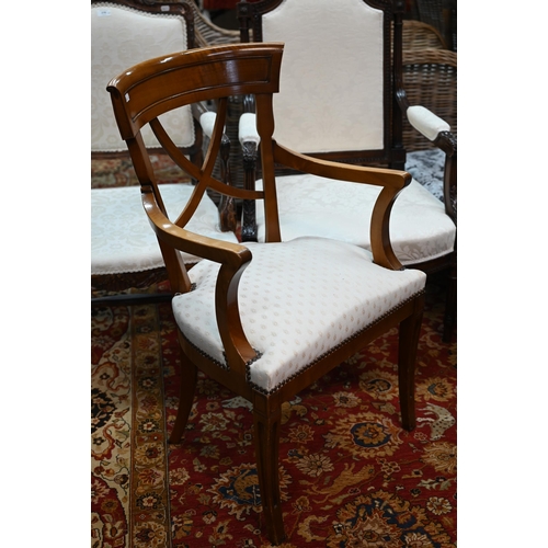 276 - Three differing continental carved walnut framed and fabric panelled salon open armchairs (3)