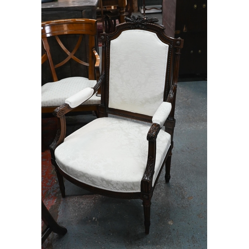 276 - Three differing continental carved walnut framed and fabric panelled salon open armchairs (3)