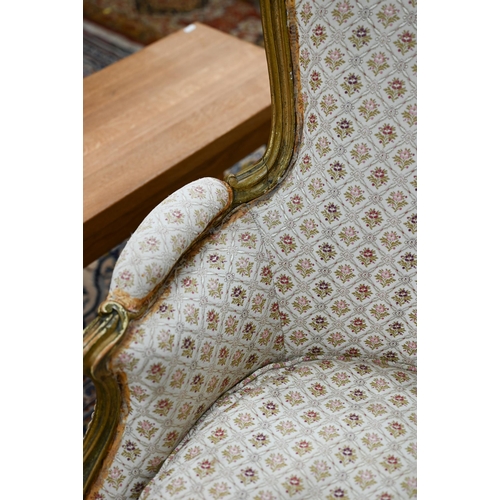 280 - An old Continental gilt frame salon armchair with patterned fabric upholstery