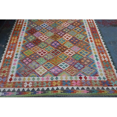 284 - A contemporary Anatolian Turkish Kelim, overall multi-coloured geometric design, 245 cm x 178 cm