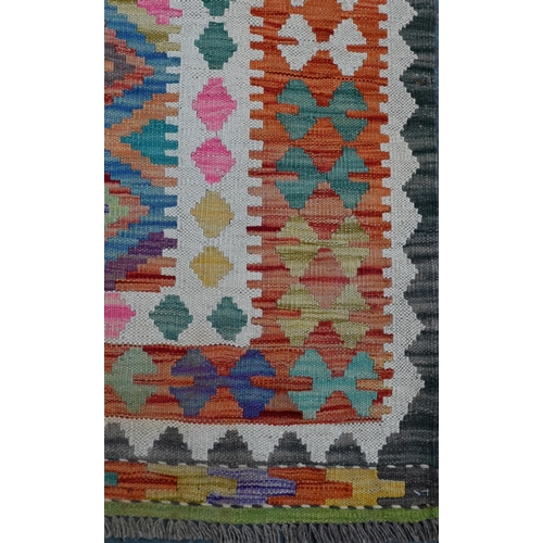 284 - A contemporary Anatolian Turkish Kelim, overall multi-coloured geometric design, 245 cm x 178 cm