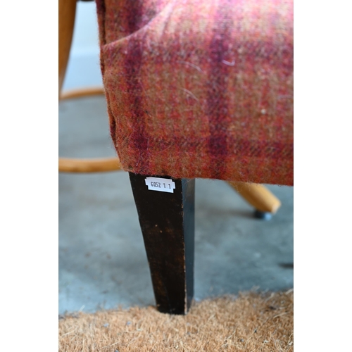 295 - An upholstered children's bedroom armchair, in tartan tweed upholstery