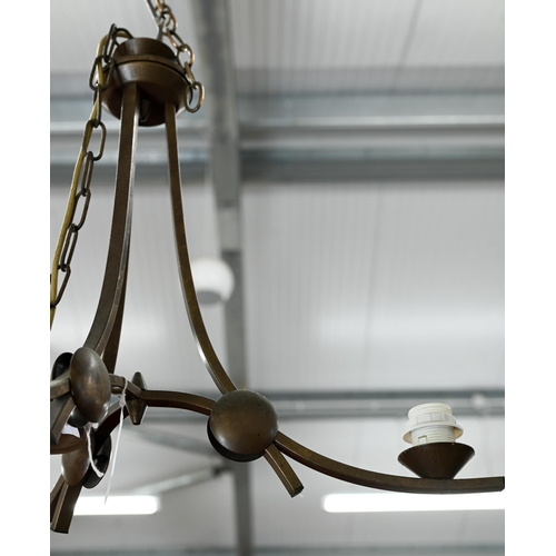 299 - # A bronzed metal three branch electrolier/chandelier, approx 50 cm high