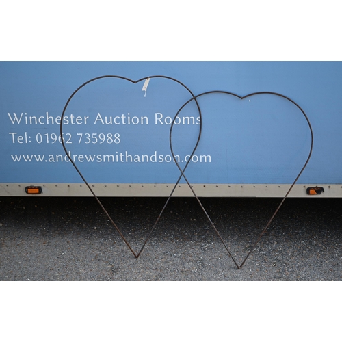 34 - A pair of weathered steel heart shaped garden plant frames, 80 cm w x 105 cm h