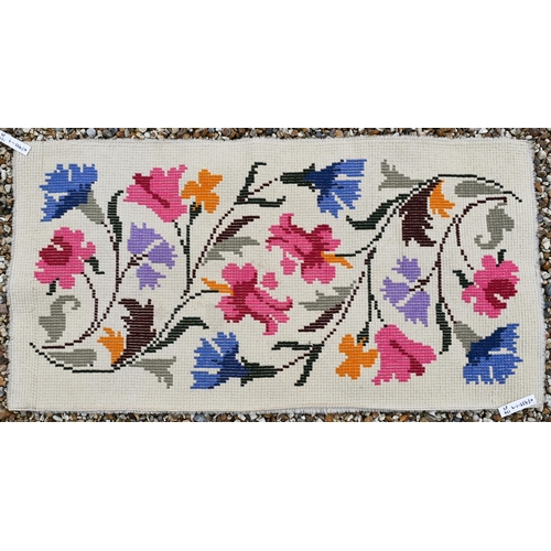 375 - A vintage thick-piled wool floral rug, 134 x 69 cm