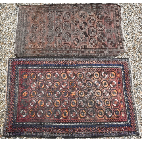 382 - An old Balouchi brown ground rug with repeating octagonal gul design, 212 x 131 cm to/w Afghan rug w... 