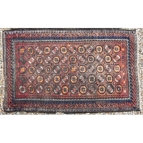 382 - An old Balouchi brown ground rug with repeating octagonal gul design, 212 x 131 cm to/w Afghan rug w... 