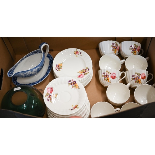 403 - A china part tea service, printed with floral sprays to/w a Wedgwood blue and white gravy-boat and V... 