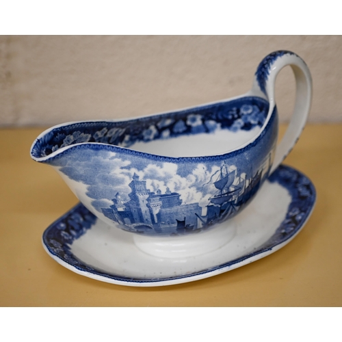 403 - A china part tea service, printed with floral sprays to/w a Wedgwood blue and white gravy-boat and V... 