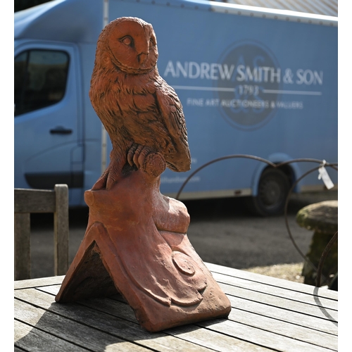 44 - A reconstituted aged terracotta 'owl' ridge tile
