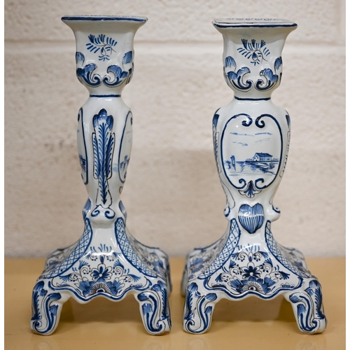 444 - A pair of Delft blue and white candlesticks 24 cm high to/w a Meissen coffee cup and two saucers, pa... 