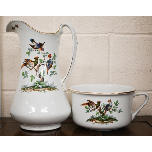 445 - # A Newport pottery (Burslem) ewer, basin and chamberpot set, printed with birds