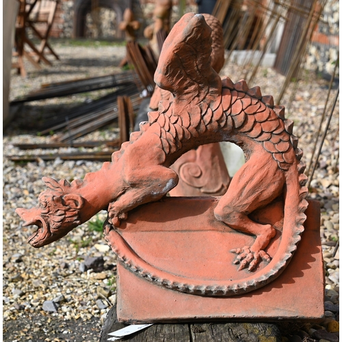 45 - A reconstituted aged terracotta 'dragon' ridge tile, 43 cm high 