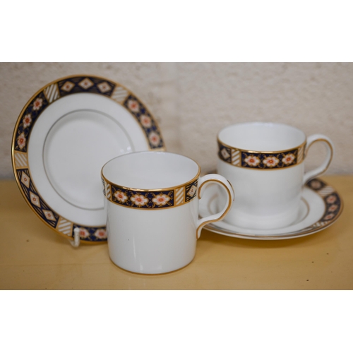 458 - A Royal Crown Derby set of eight 'Kedleston' coffee cans and saucers, 1986