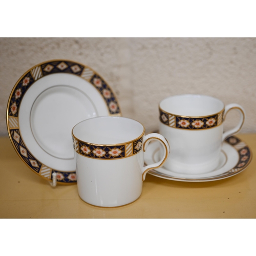 458 - A Royal Crown Derby set of eight 'Kedleston' coffee cans and saucers, 1986