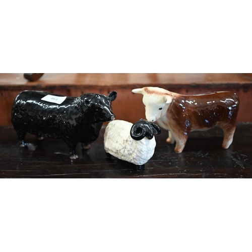 461 - A Beswick Aberdeen Angus bull 20 cm long, to/w a Coopercraft bull and ram, two other bulls and a ram... 