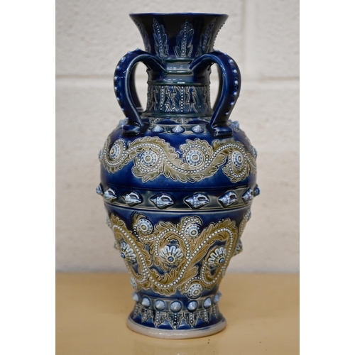 465 - A Victorian Doulton Lambeth embosed stoneware vase with four loop handles, by George Tinworth, 28cm ... 