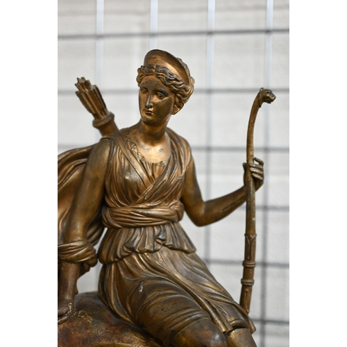 470 - A late 19th century bronzed spelter mantel clock case, surmounted by the figure of a classical huntr... 