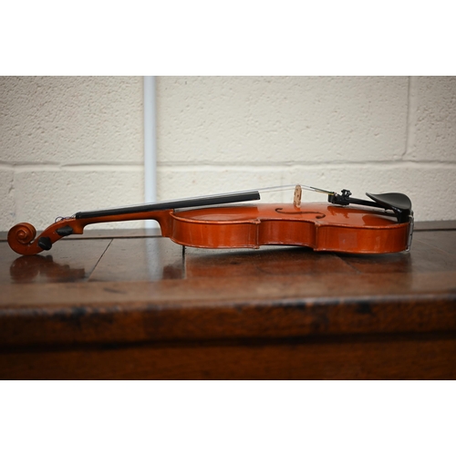 477 - A Stentor Student II violin in case with two bows, to/w a Chinese child's violin with case (2)