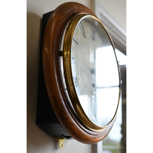 495 - A walnut-cased wall-clock with 29 cm dial and brass bezel