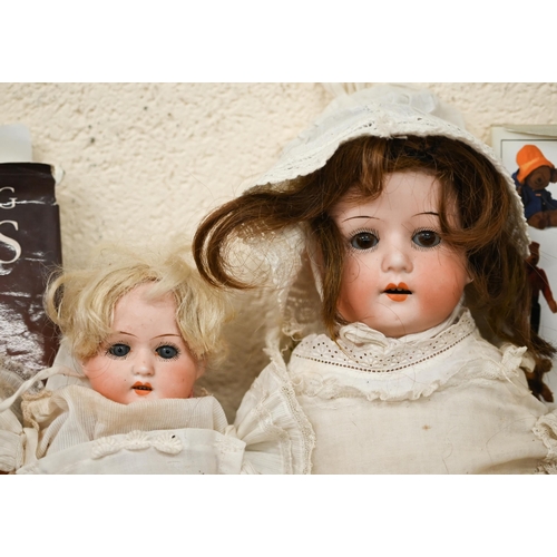 502 - Two Heubach Koppelsdorf 275 bisque-headed dolls with stitched leather bodies, 49 cm and 38 cm, to/w ... 