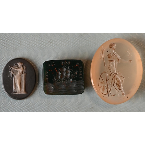 505 - Various polished stone items, including chalcedony intaglio depicting Britannia, another with ship a... 