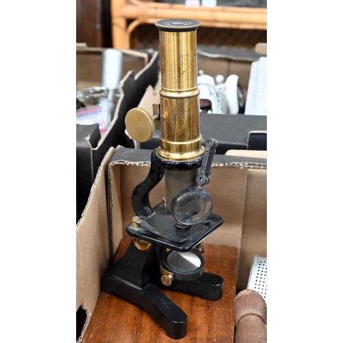 517 - A vintage boxed student's microscope, to/w three antique 'hot stone' irons and a flatiron, a spice/c... 