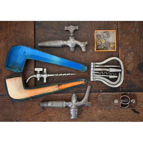 523 - A plated steel five-tool bow corkscrew, to/w a Continental white metal folding comb and a silver and... 