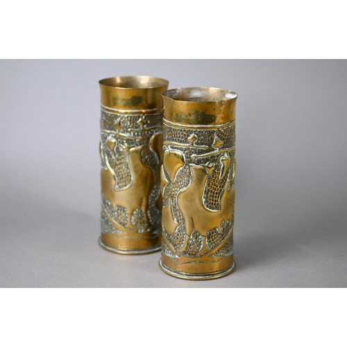 528 - Two trench-art brass shell-cases, embossed with cockerels and foliage, 17 cm high (2)