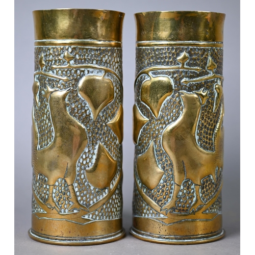 528 - Two trench-art brass shell-cases, embossed with cockerels and foliage, 17 cm high (2)