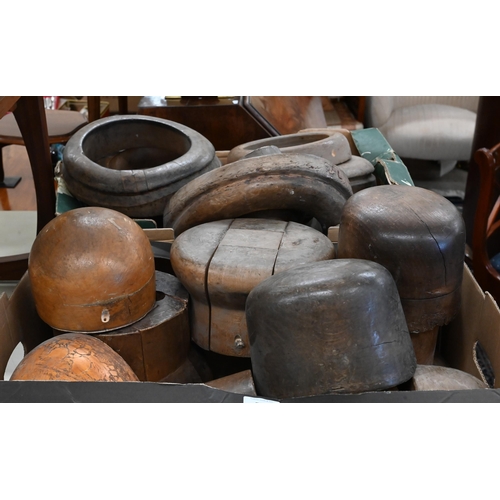 529 - A good collection of antique milliner's wooden hat blocks and brims, all unnamed, two numbered examp... 