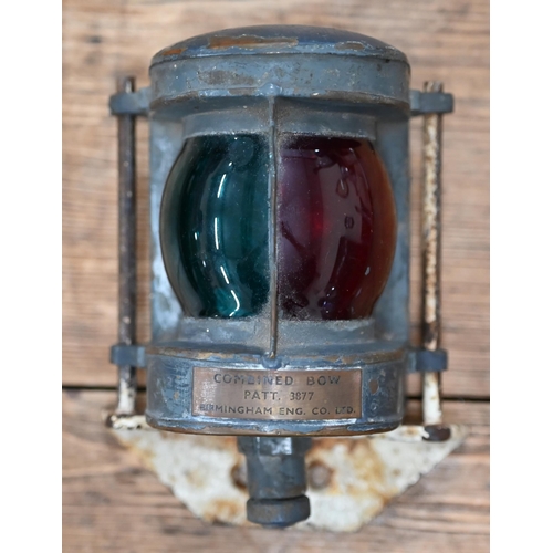 534 - A vintage copper yacht's two-colour bow lamp to/w an Asprey EPNS hip-flask with detachable beaker,  ... 