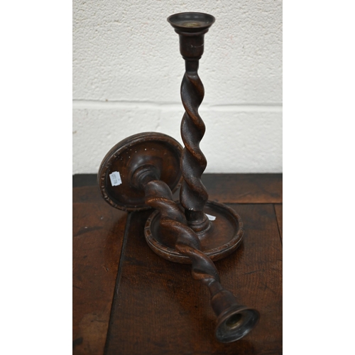 536 - A Black Forest wall bracket carved with a bird, 18.5 cm, to/w a pair of oak twist candlesticks and a... 