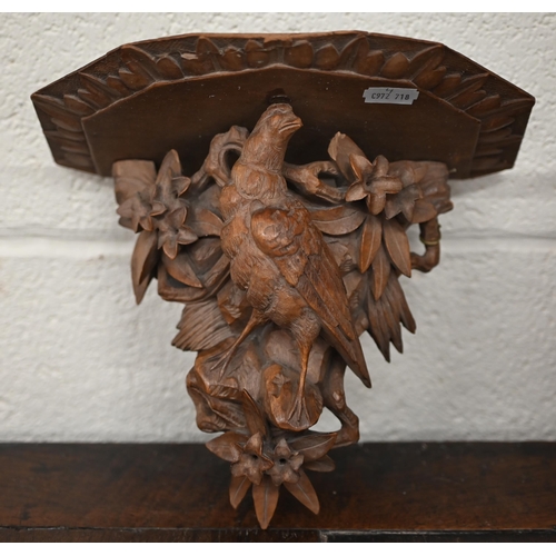 536 - A Black Forest wall bracket carved with a bird, 18.5 cm, to/w a pair of oak twist candlesticks and a... 