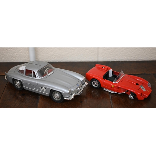 539A - Four Burago model cars